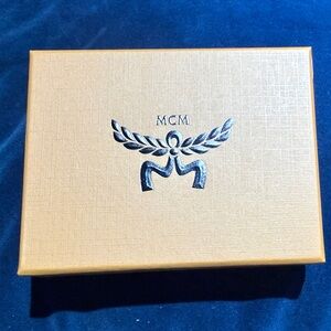 MCM Tan Box with Iconic Emblem